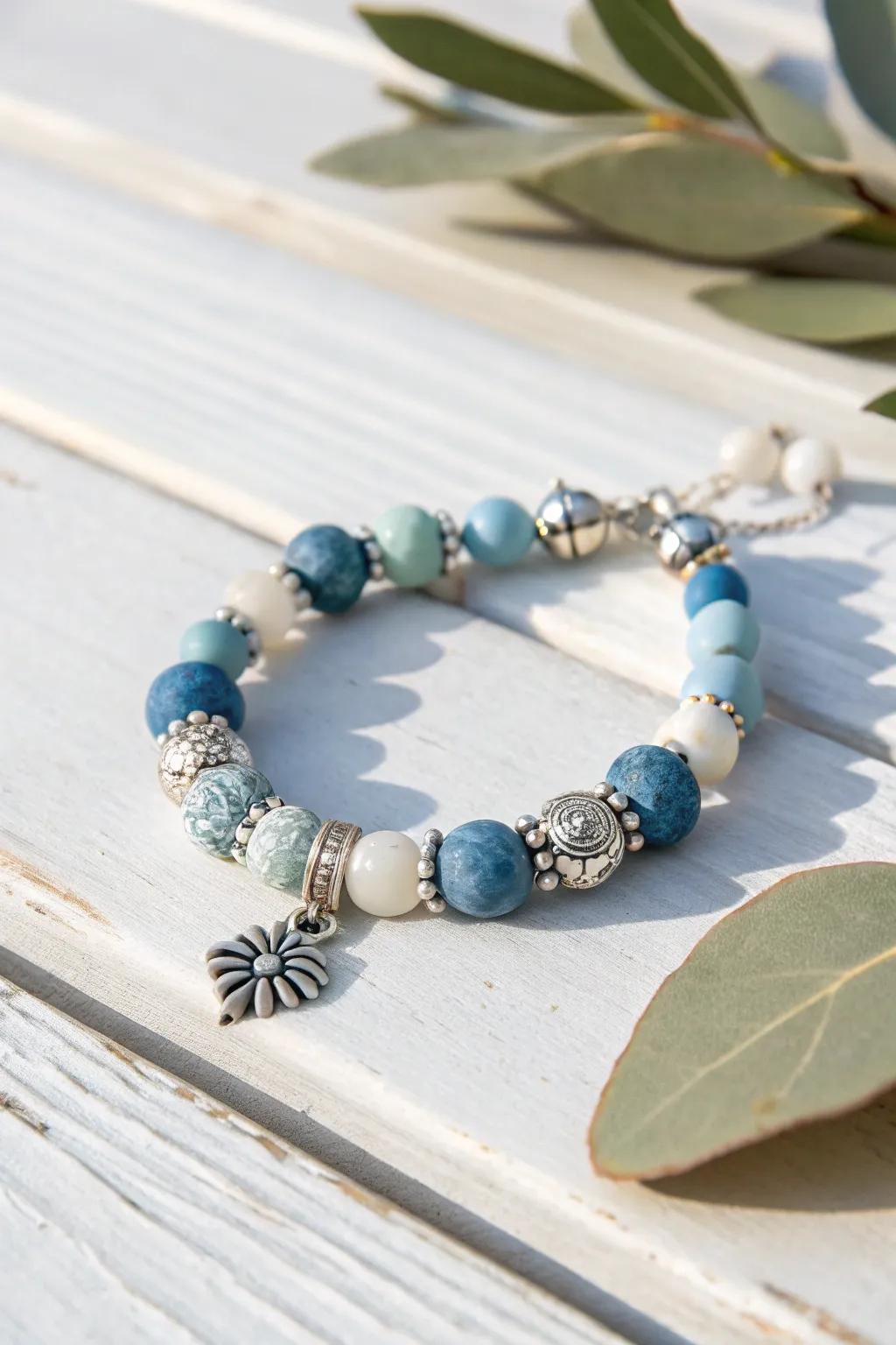 Embrace the calm of the ocean with this stunning handmade clay bead bracelet, perfect for adding a touch of coastal elegance to your style.
