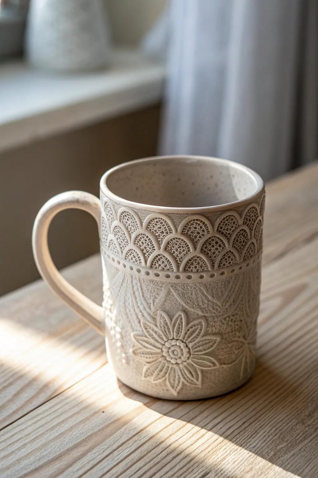 Start your day with elegance—sip from a mug adorned with textured lace patterns. ☕✨ #CoffeeArt #ScandinavianDesign