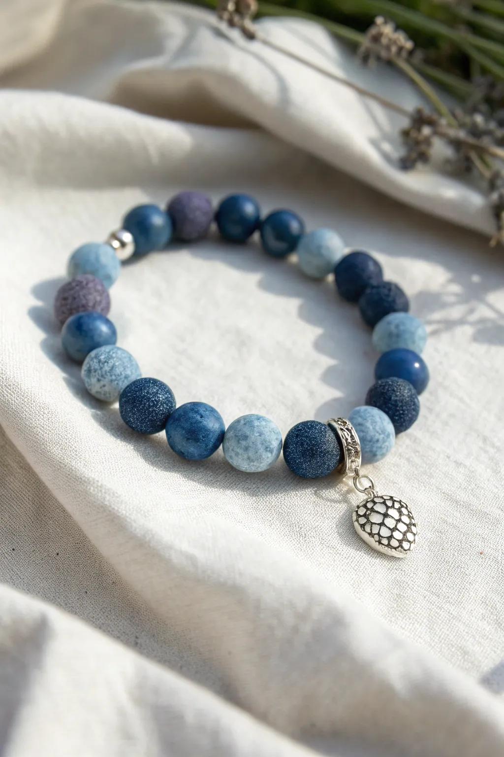 Embrace the essence of summer with this Blueberry Delight clay bead bracelet, a perfect blend of boho charm and Scandinavian minimalism.