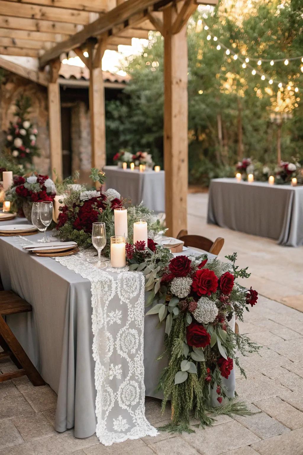 Burgundy and soft gray create a refined and romantic wedding setting.