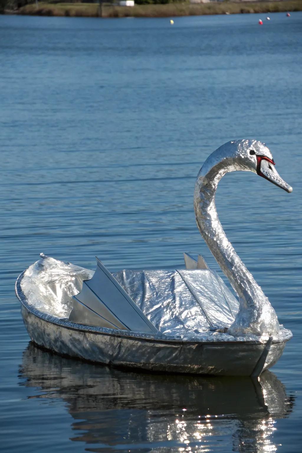 Sail with elegance: A masterfully crafted tin foil swan boat.