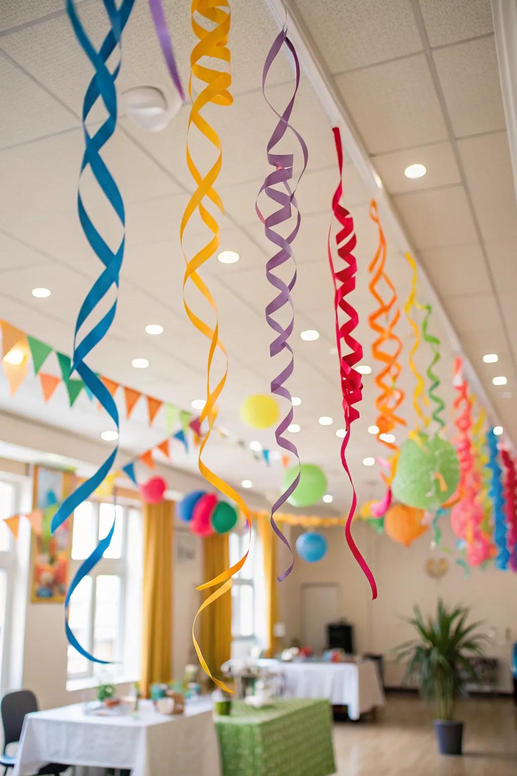 A room transformed into a festive space with vibrant streamers creating a sense of movement.