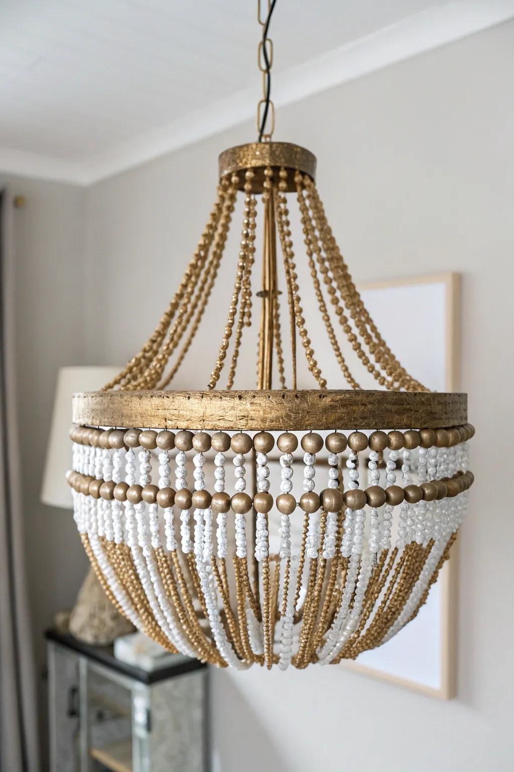 Elevate your space with a DIY chandelier that blends matte and shiny metallics for a touch of modern sophistication.