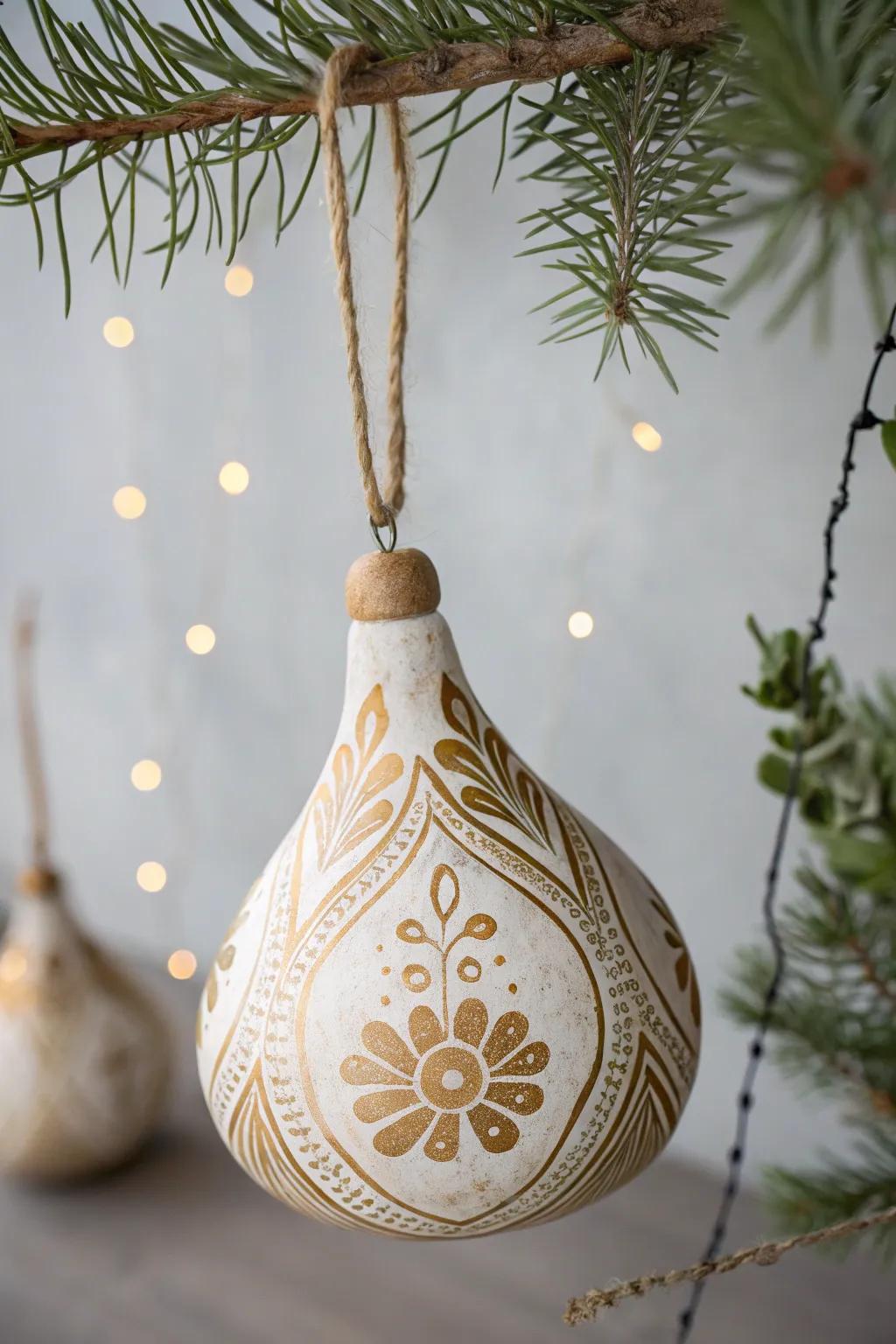 Add a touch of handmade elegance to your holiday decor with these charming painted gourd ornaments.