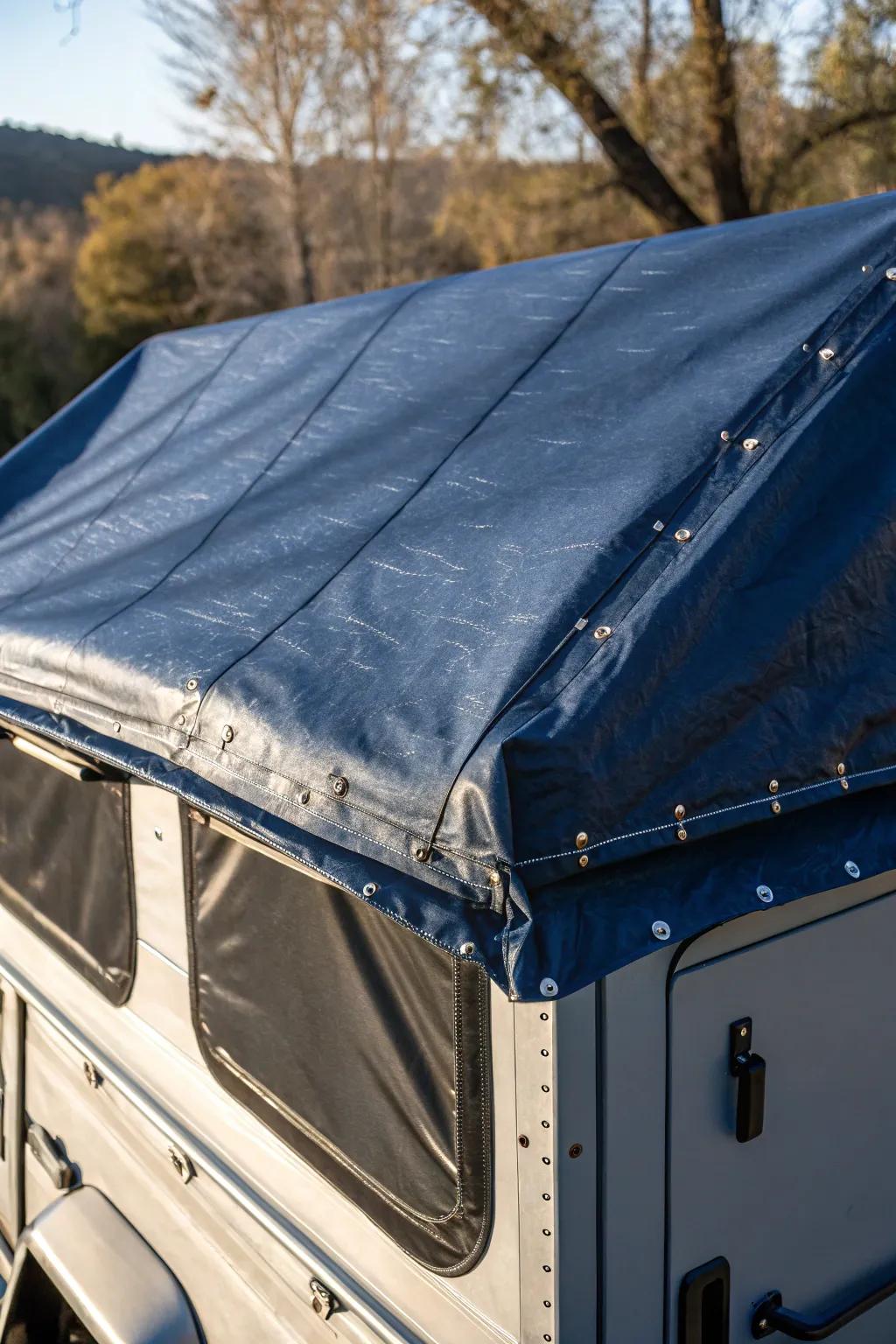 Craftsmanship meets practicality: A heavy-duty tarp offers robust protection for your camper.