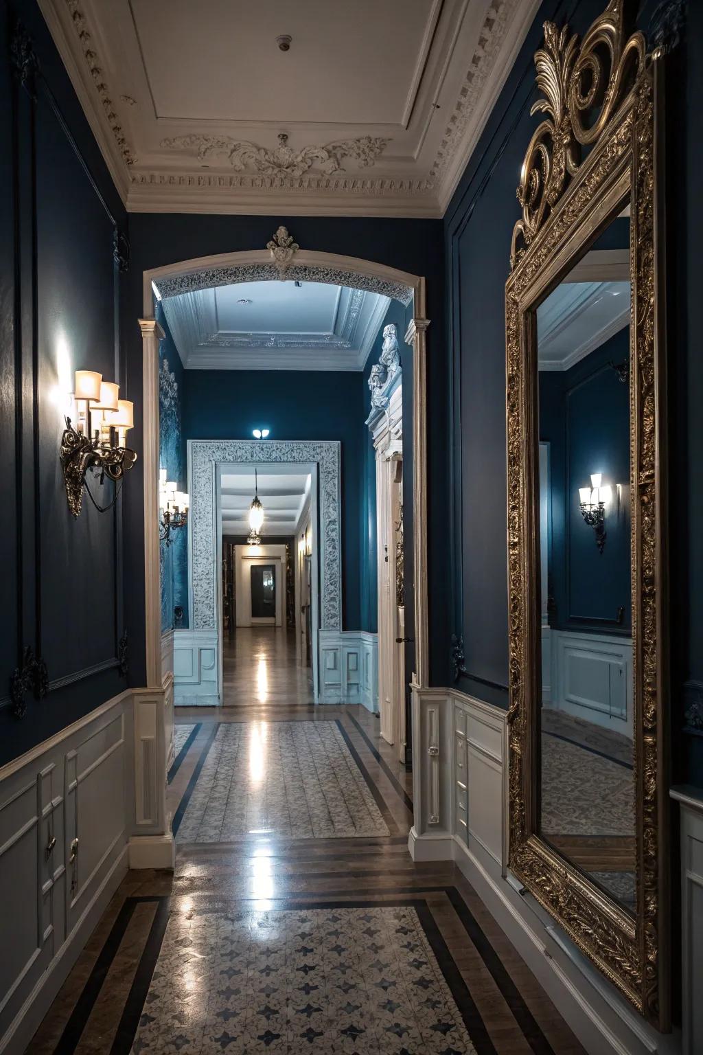 Reflective surfaces expand the visual space in a dark blue hallway.