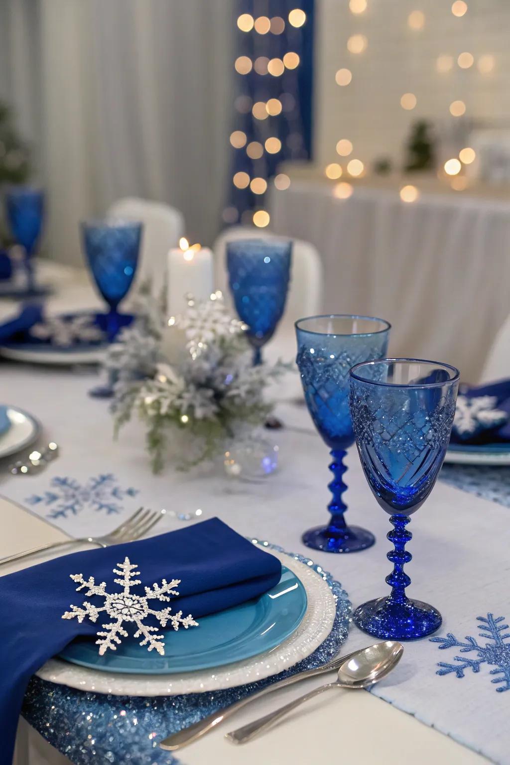 Snowflakes and royal blue decor bring a winter wonderland theme to the table.