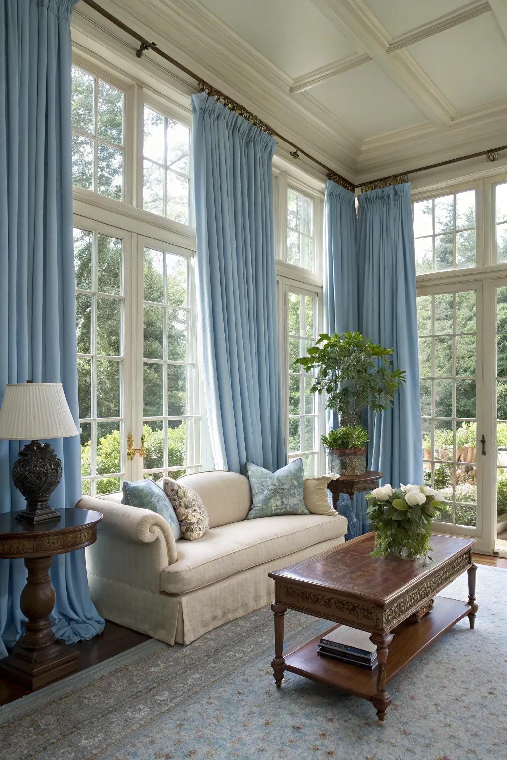 Floor-to-ceiling drapes offer drama and elegance.