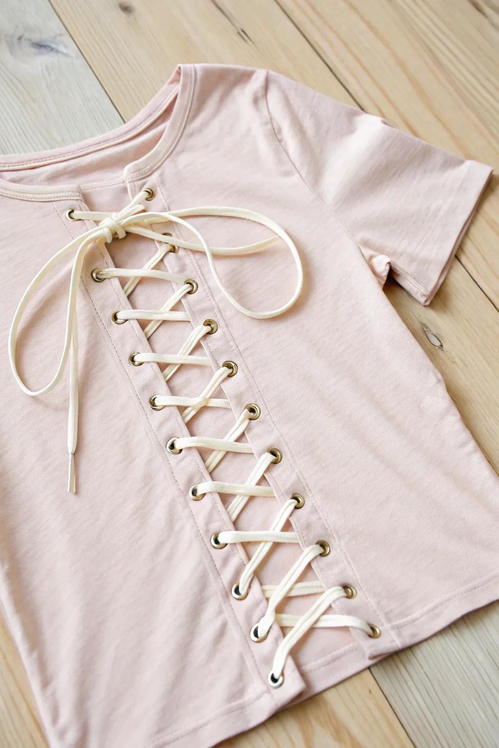 Transform your tee with a chic lace-up design—no sewing required! Embrace simplicity and elegance.