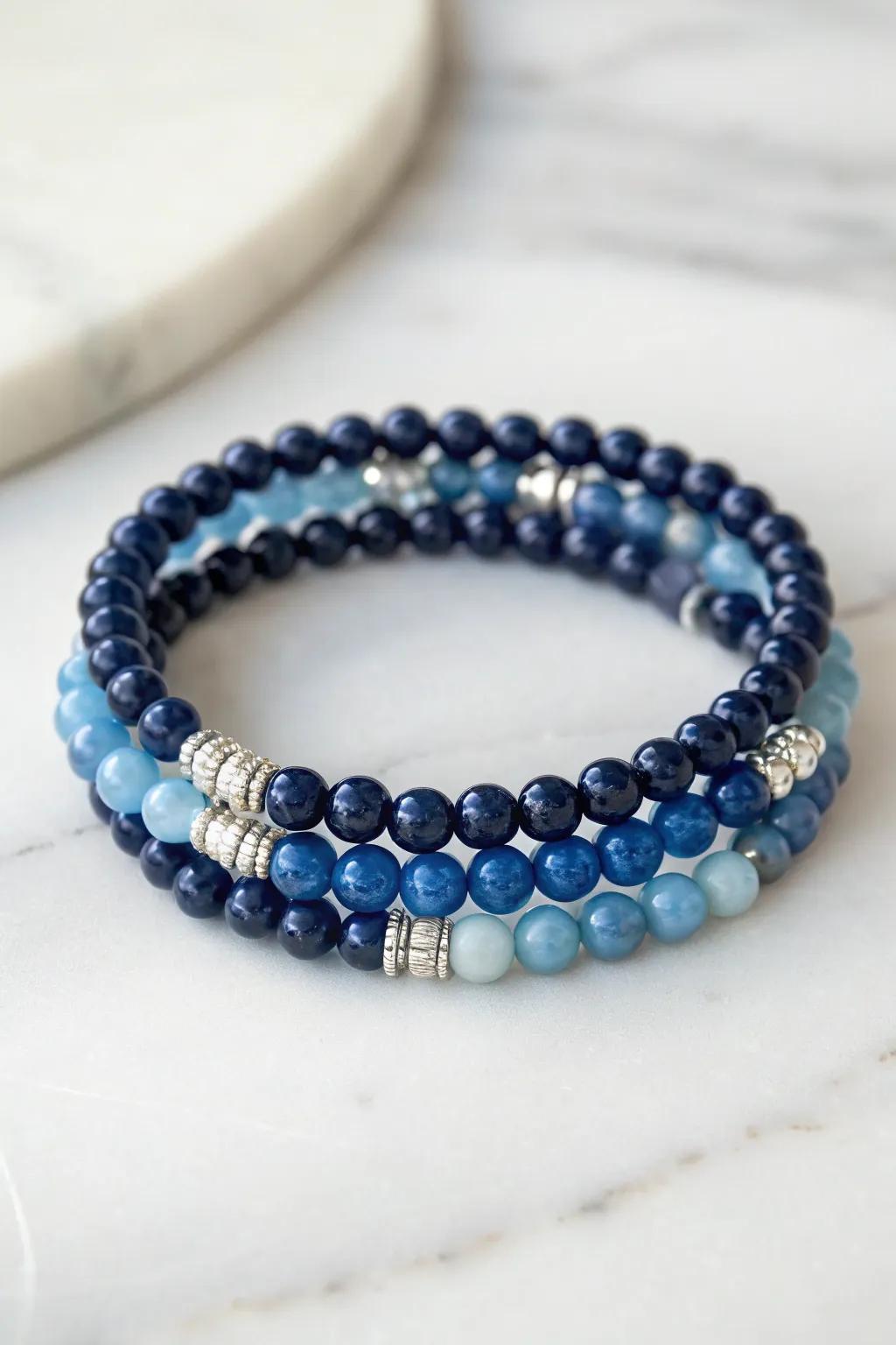 Dive into oceanic elegance with this monochromatic blue bracelet, where simplicity meets natural beauty.