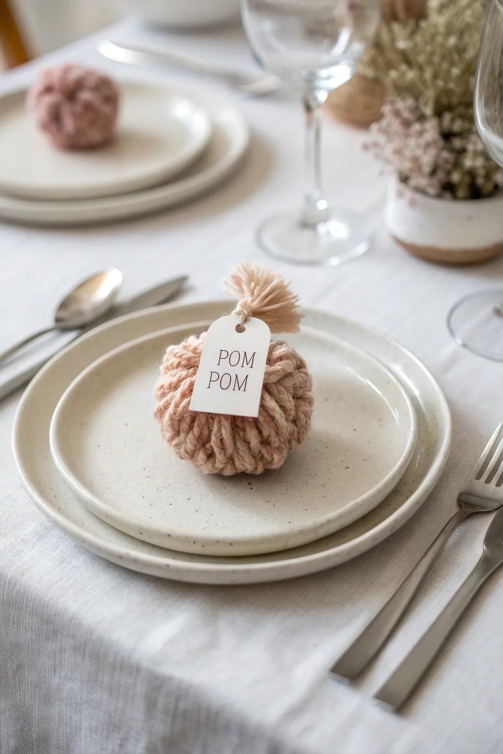 Add a touch of whimsy to your table with these charming pom pom placeholders.