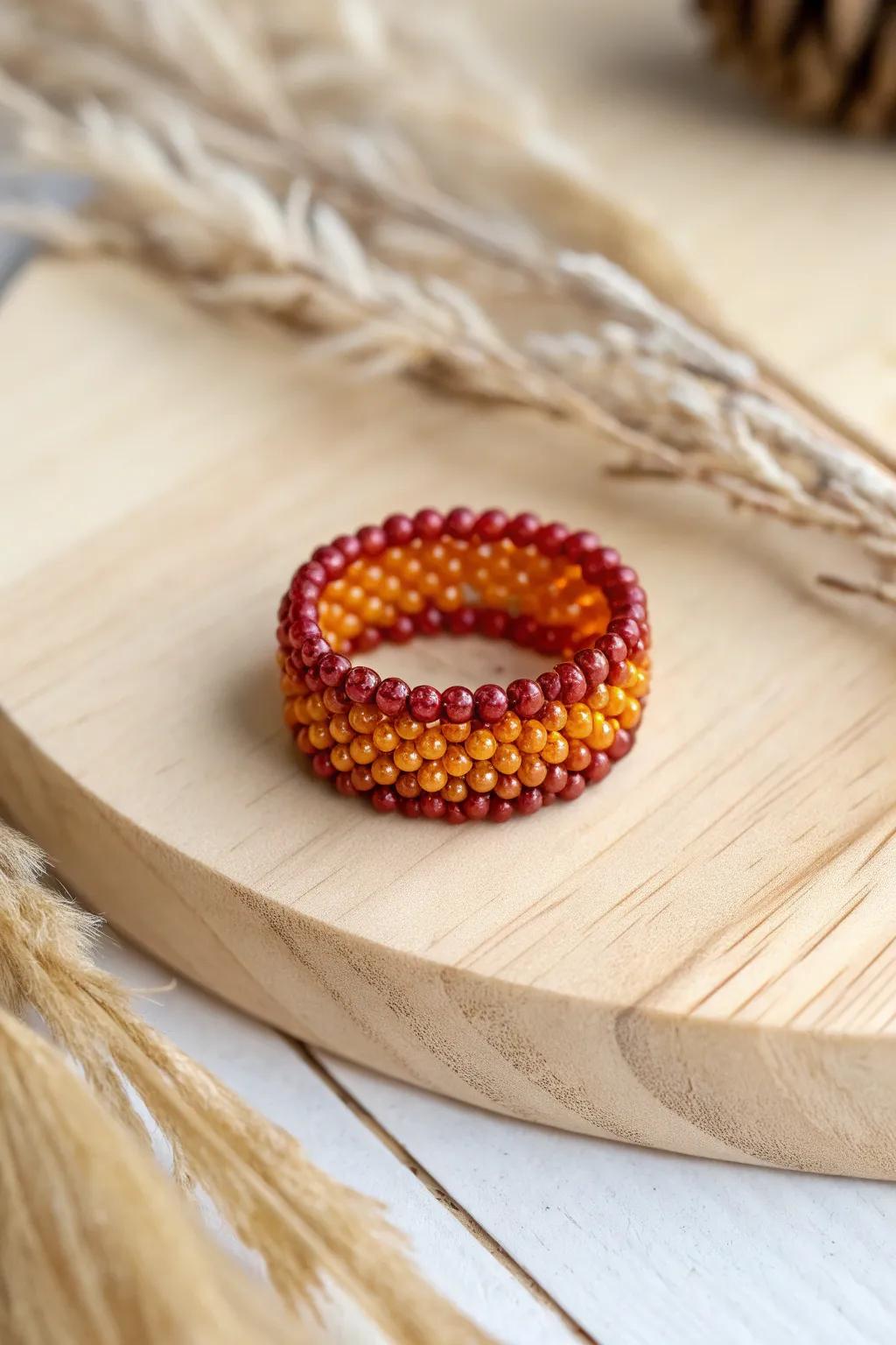 Capture the warmth of a sunset with this handcrafted seed bead ring—where simplicity meets natural beauty.