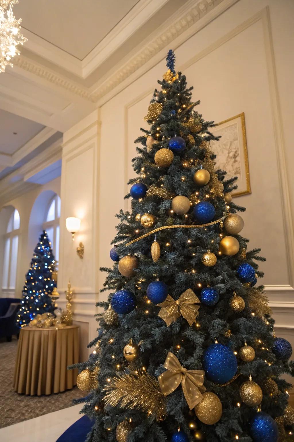 Regal elegance with a sapphire and gold-themed Christmas tree.