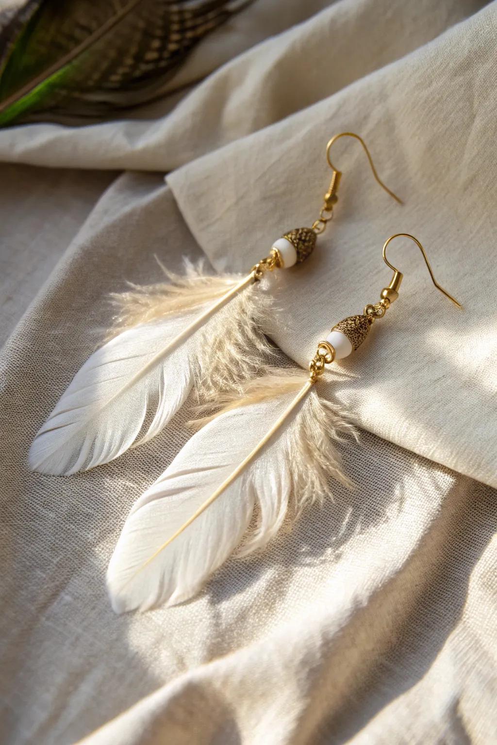 Elevate your fallen angel look with handmade feather earrings, a touch of elegance and simplicity.