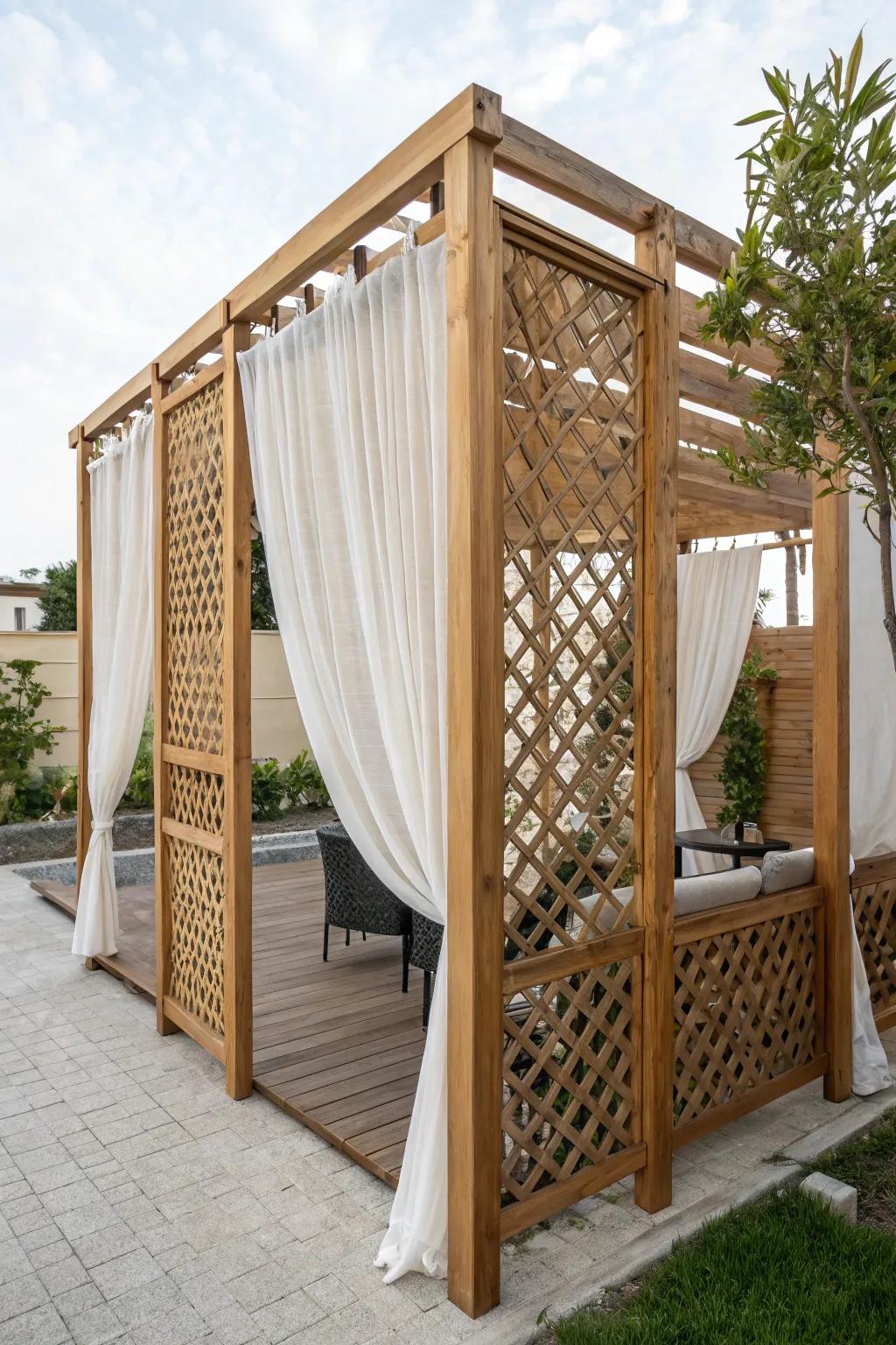 Transform your patio into a cozy retreat with a lattice privacy screen draped in weatherproof fabric, blending minimalist charm with Boho warmth.