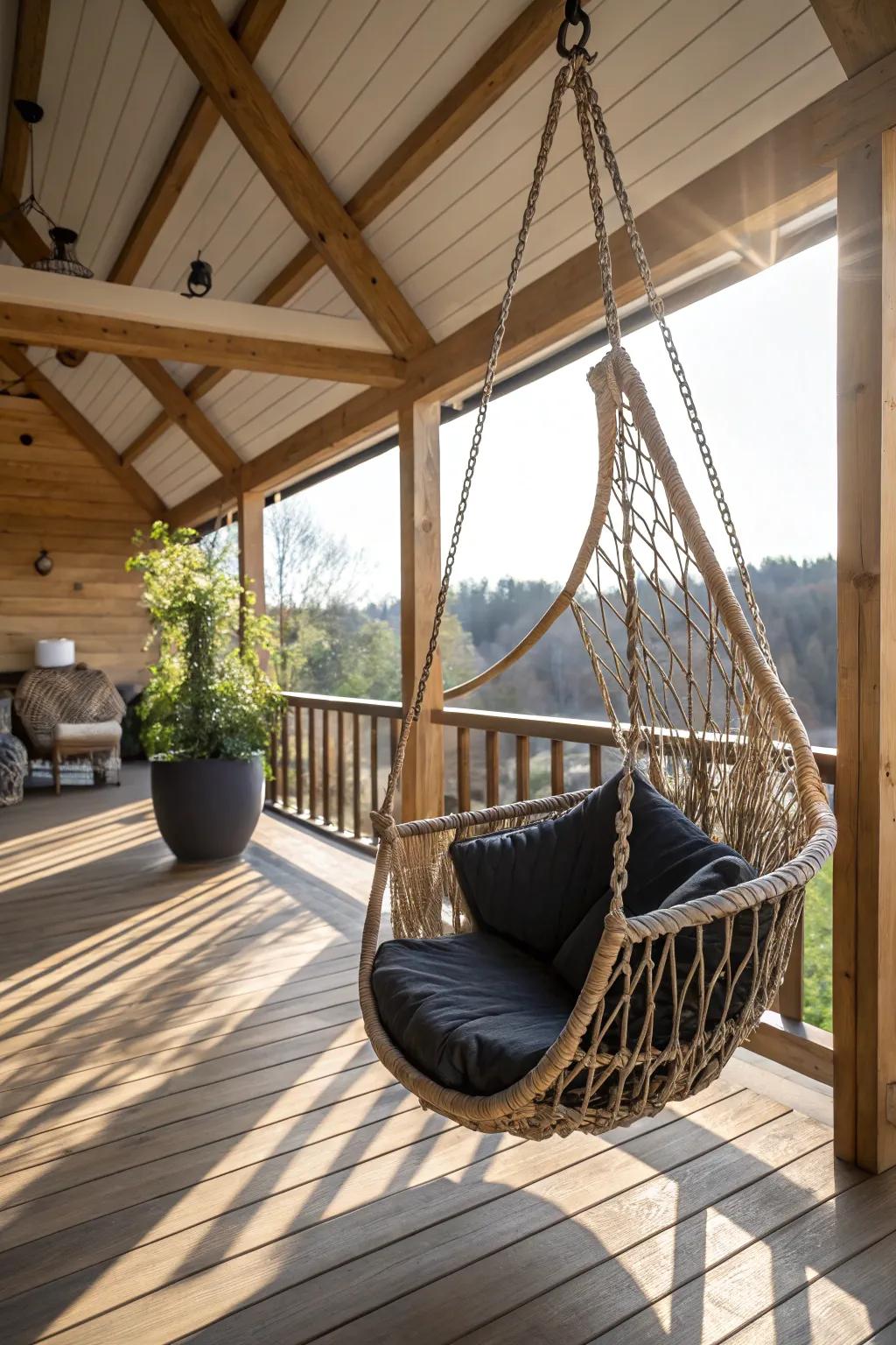 Unwind in style with a chic swinging chair on your timber porch.