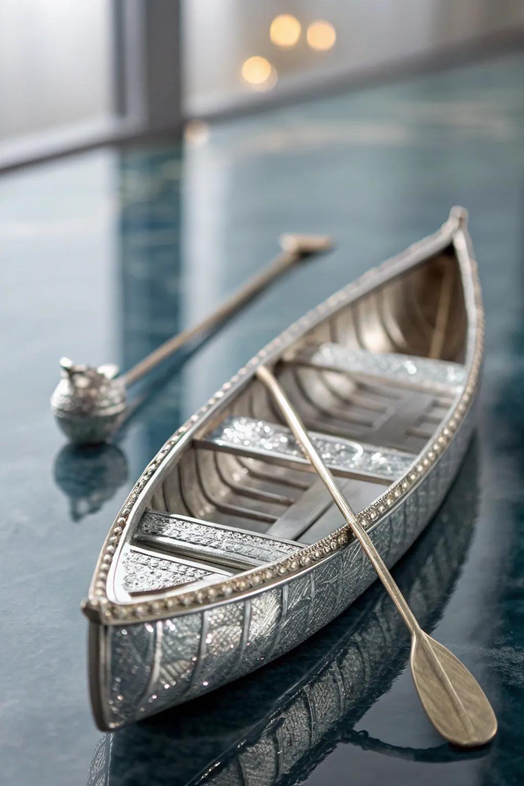 Discover the art of balance with this stunning tin foil canoe, complete with charming paddles for a touch of elegance.