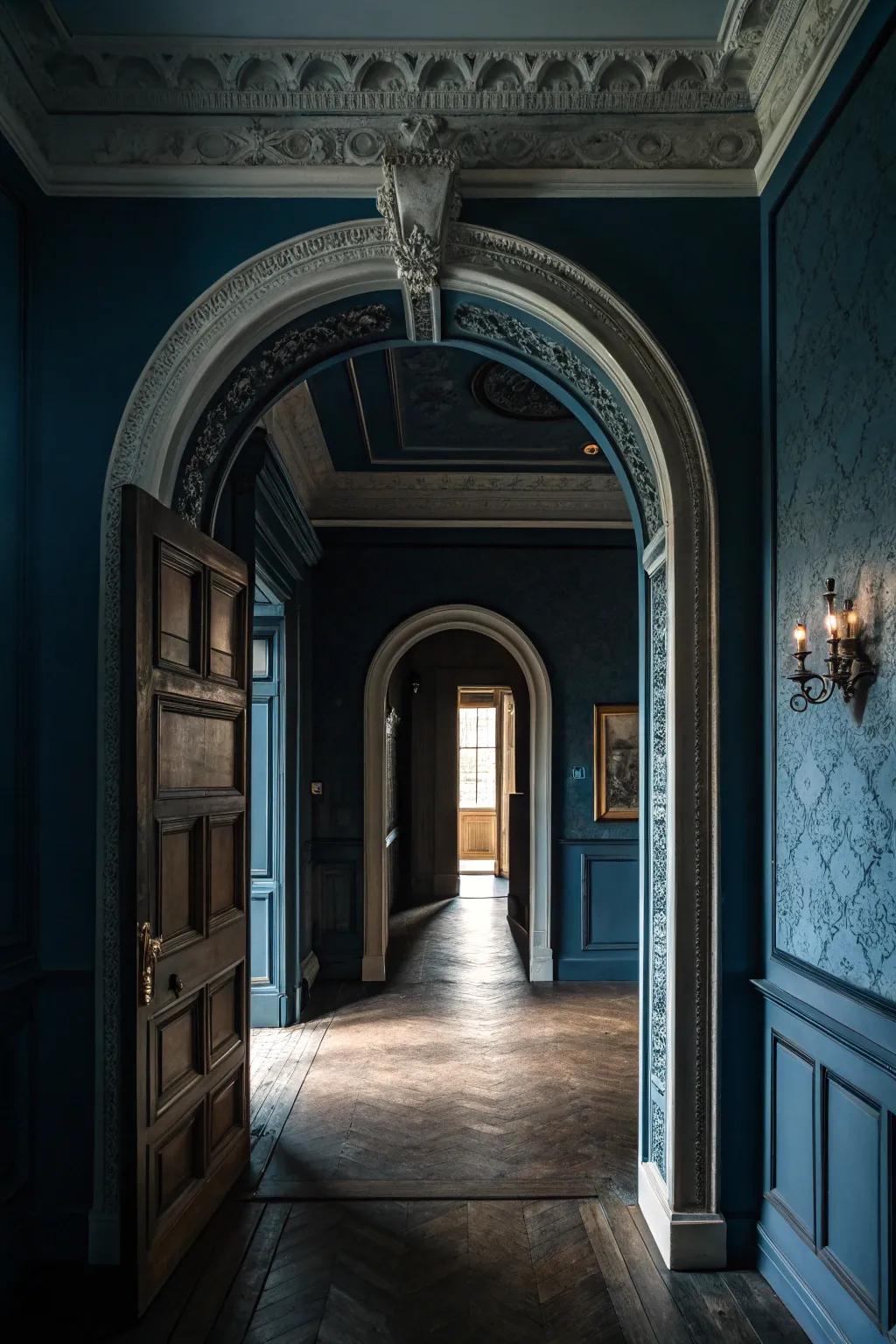 Architectural details bring sophistication to a dark blue hallway.