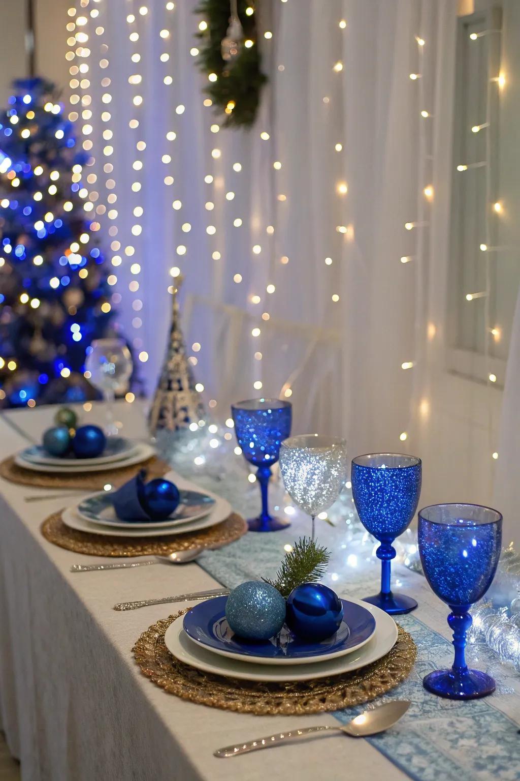 Twinkling fairy lights paired with royal blue decorations create an ethereal centerpiece.