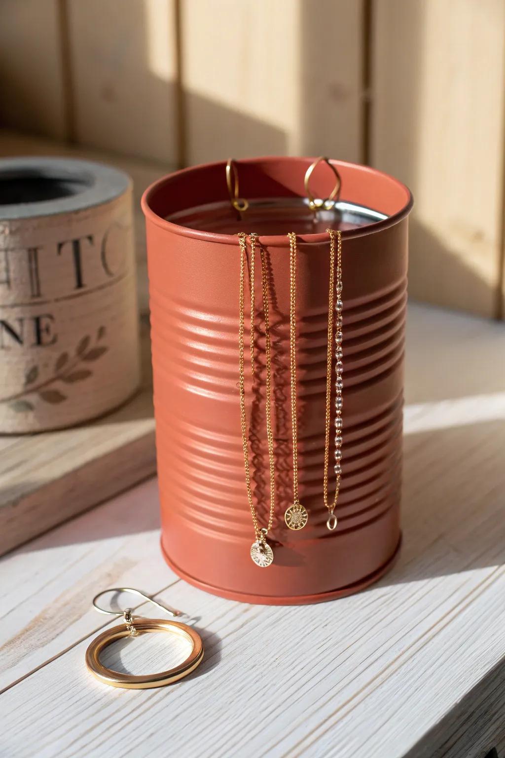Transform tin cans into chic jewelry organizers with a touch of Scandinavian elegance.