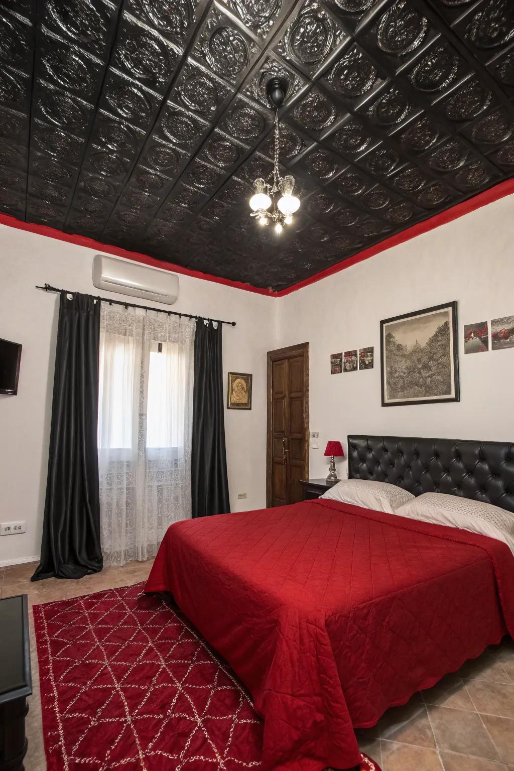 A black ceiling adds depth and drama to this chic bedroom.