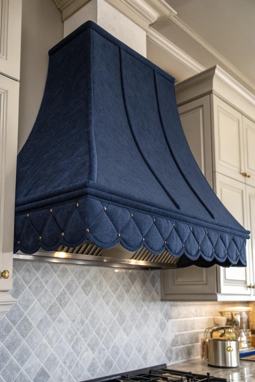 Elevate your kitchen with a touch of fabric elegance. Discover the art of upholstered range hoods for a warm, textured upgrade.