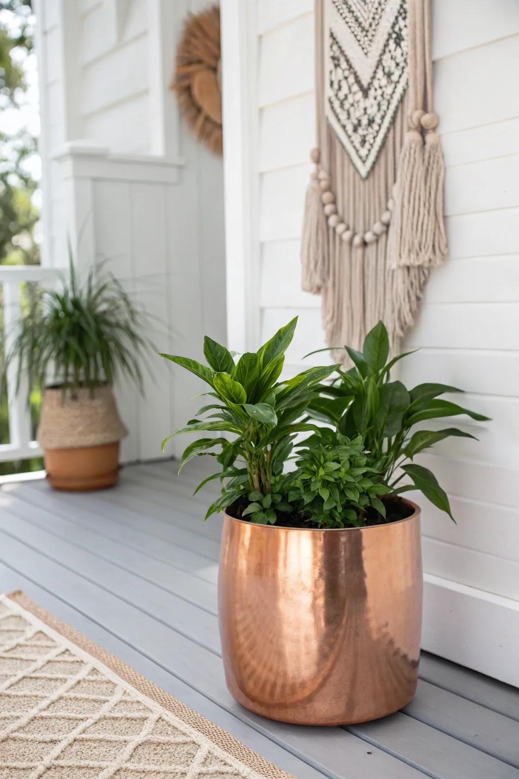 Elevate your porch with the subtle glamour of metallic accents. 🌿✨ #ScandiBoho #CopperElegance