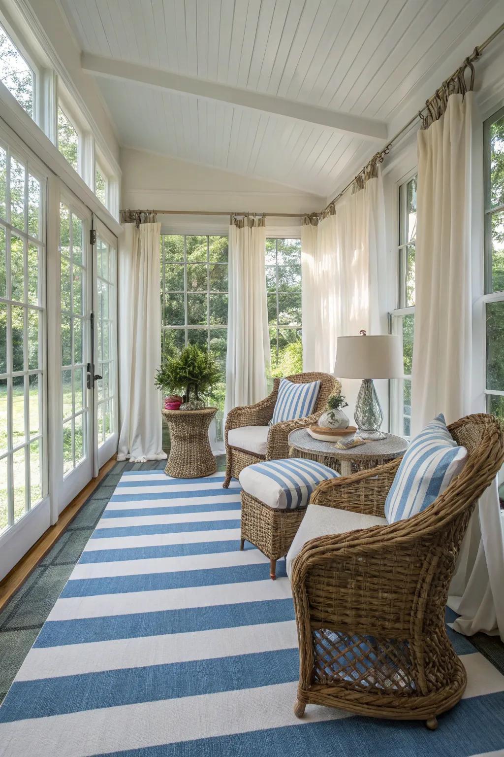 Blue and white stripes add nautical charm to the sunroom.