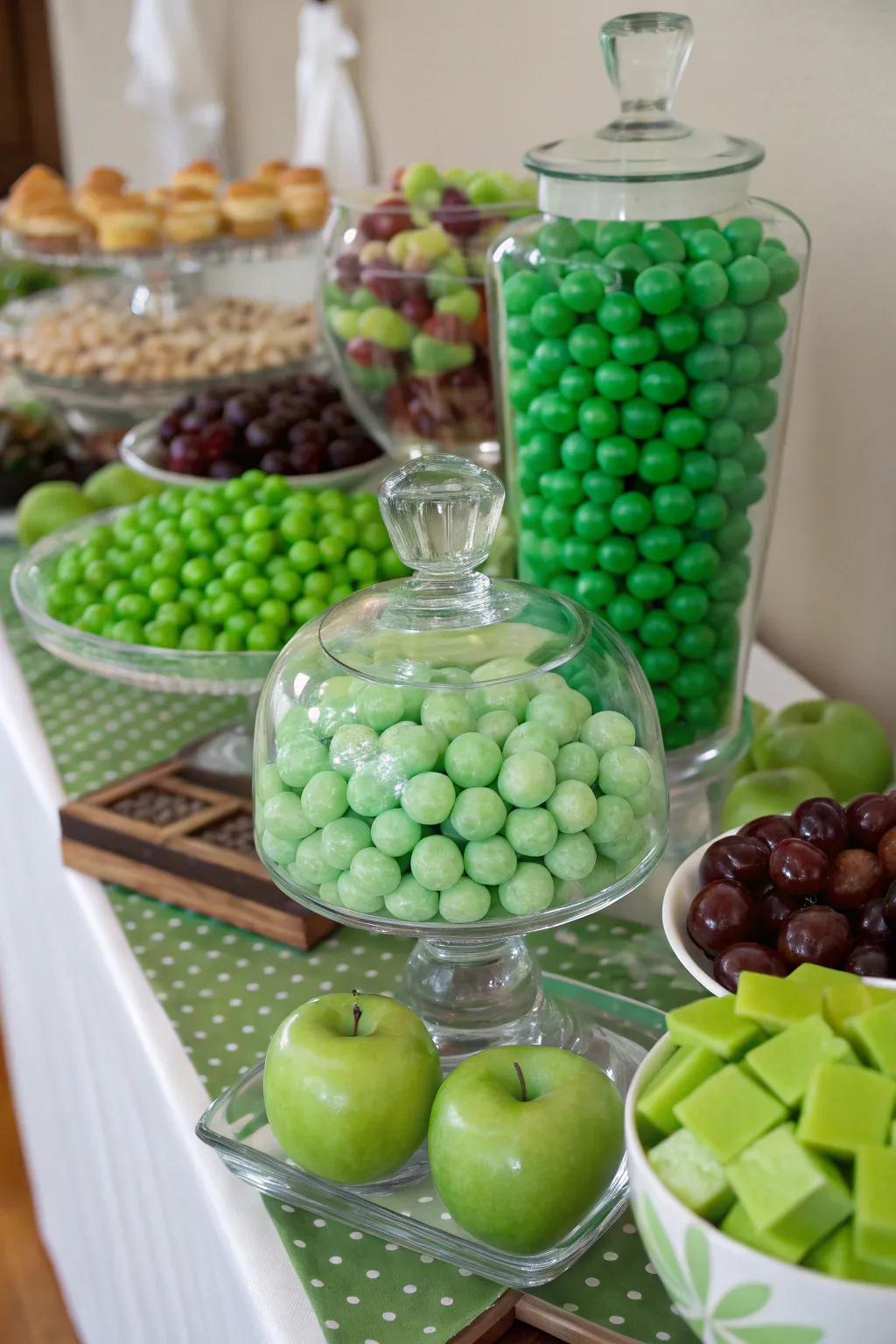 Fresh green fruits add a refreshing touch to the candy table.