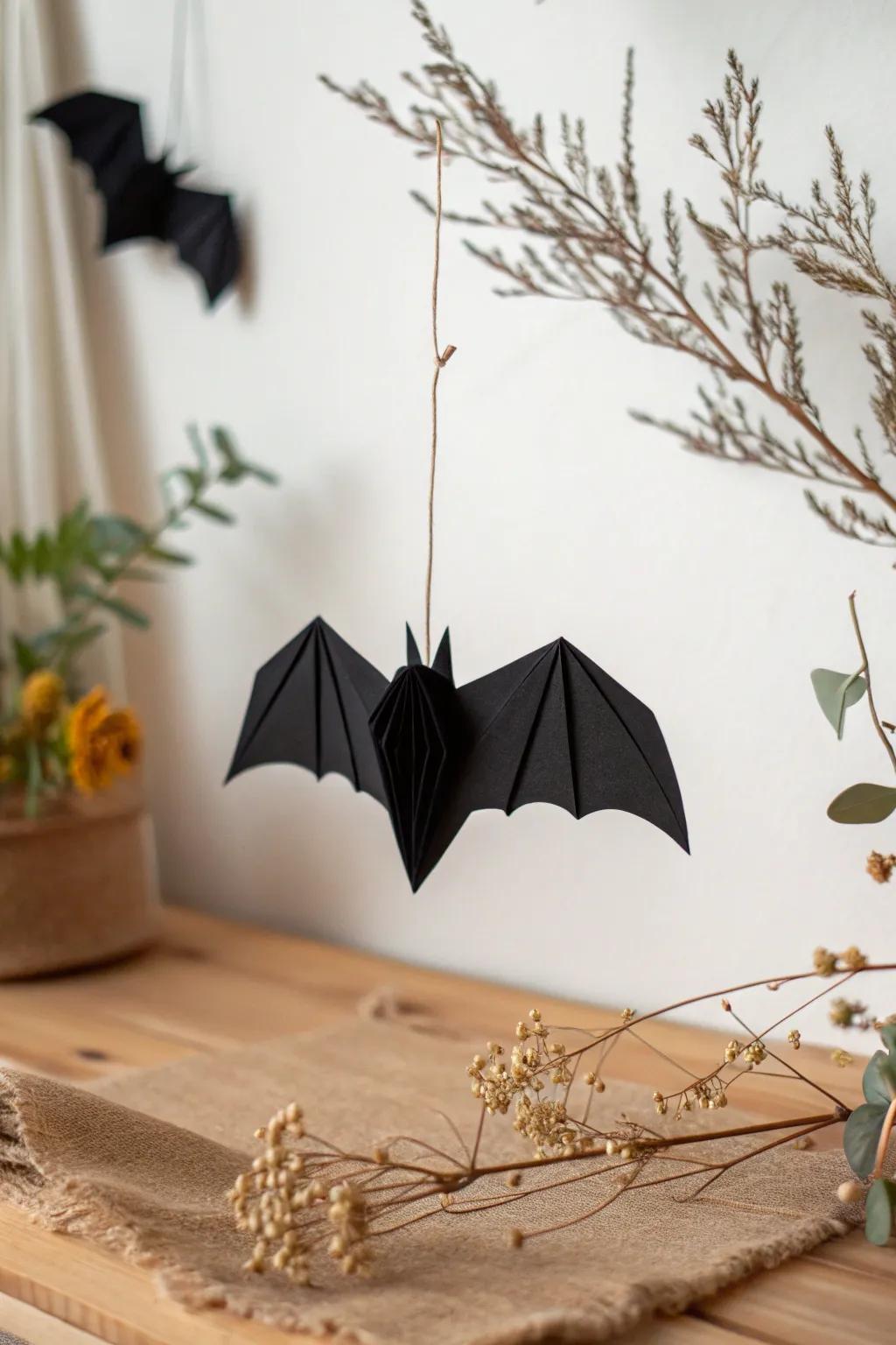 Elevate your Halloween decor with minimalist elegance: a handcrafted paper bat that captures the spirit of spooky simplicity.