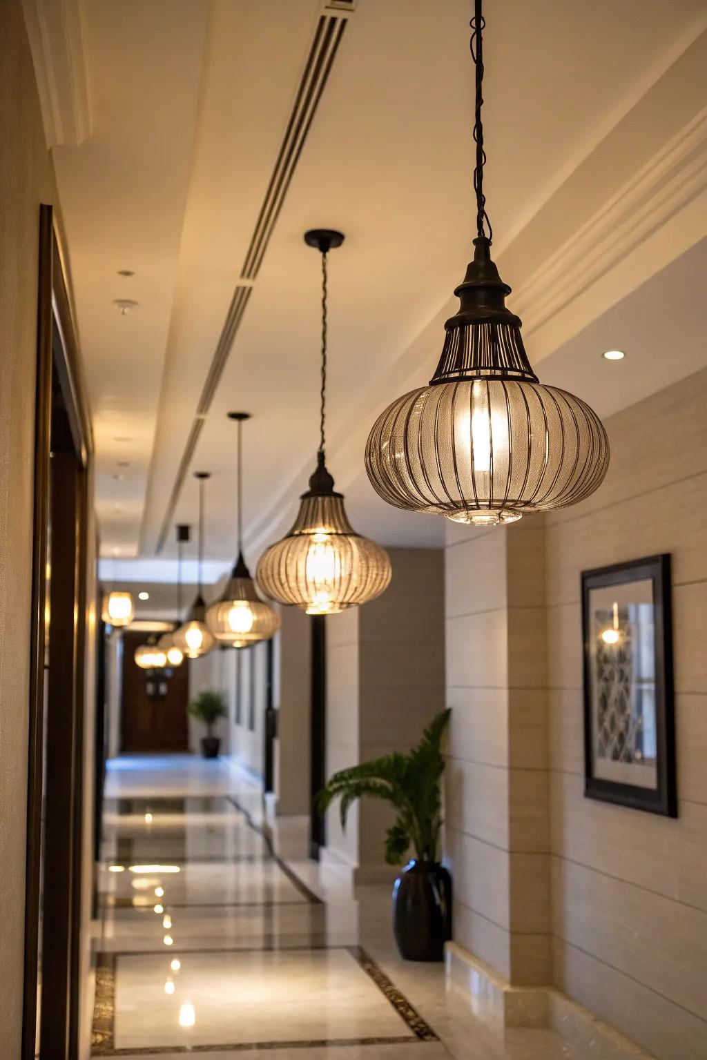 Pendant lights add a stylish and warm touch to the hallway.