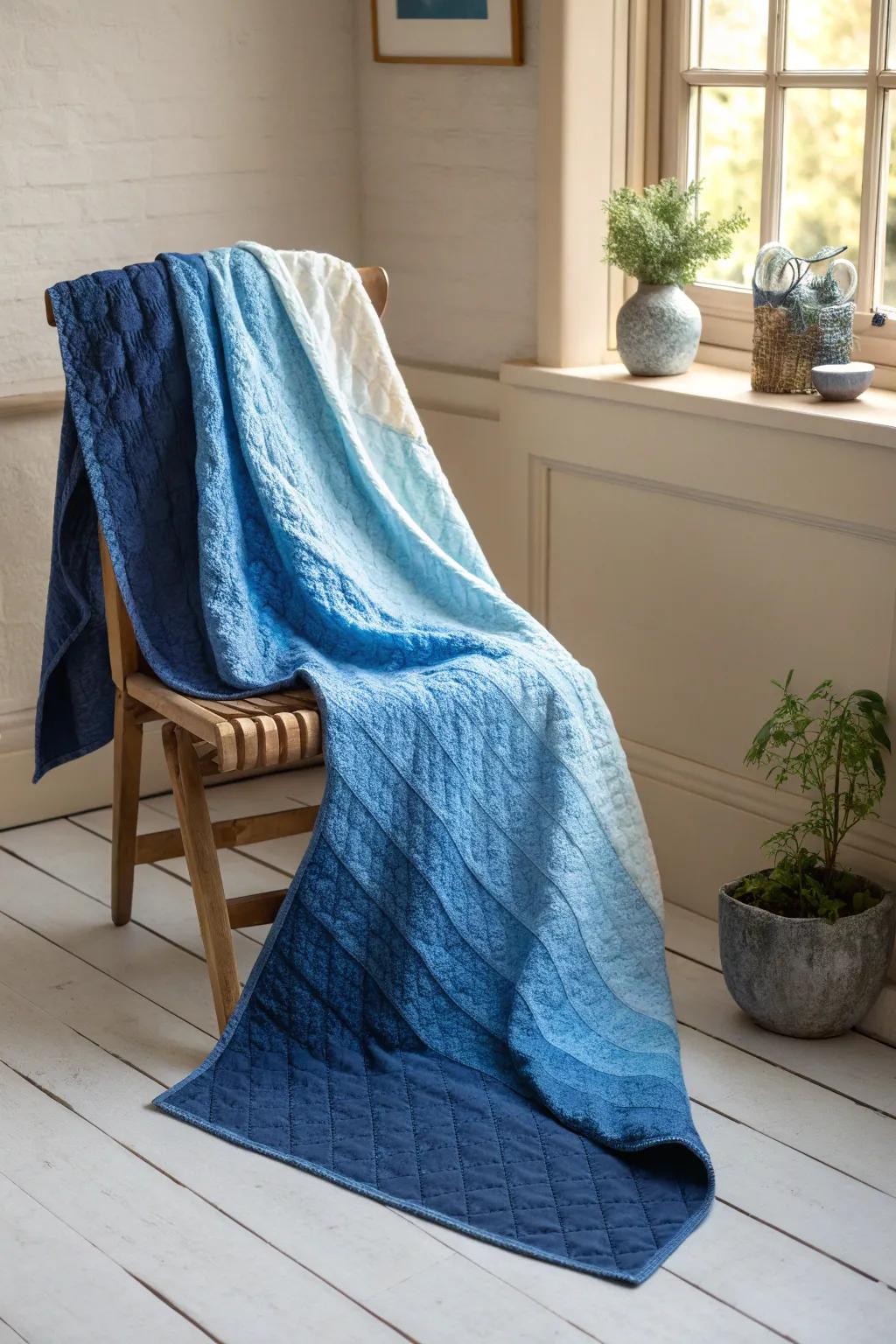 Transform your space with a stunning ombre blue quilt, where craftsmanship meets natural beauty. 🌿💙