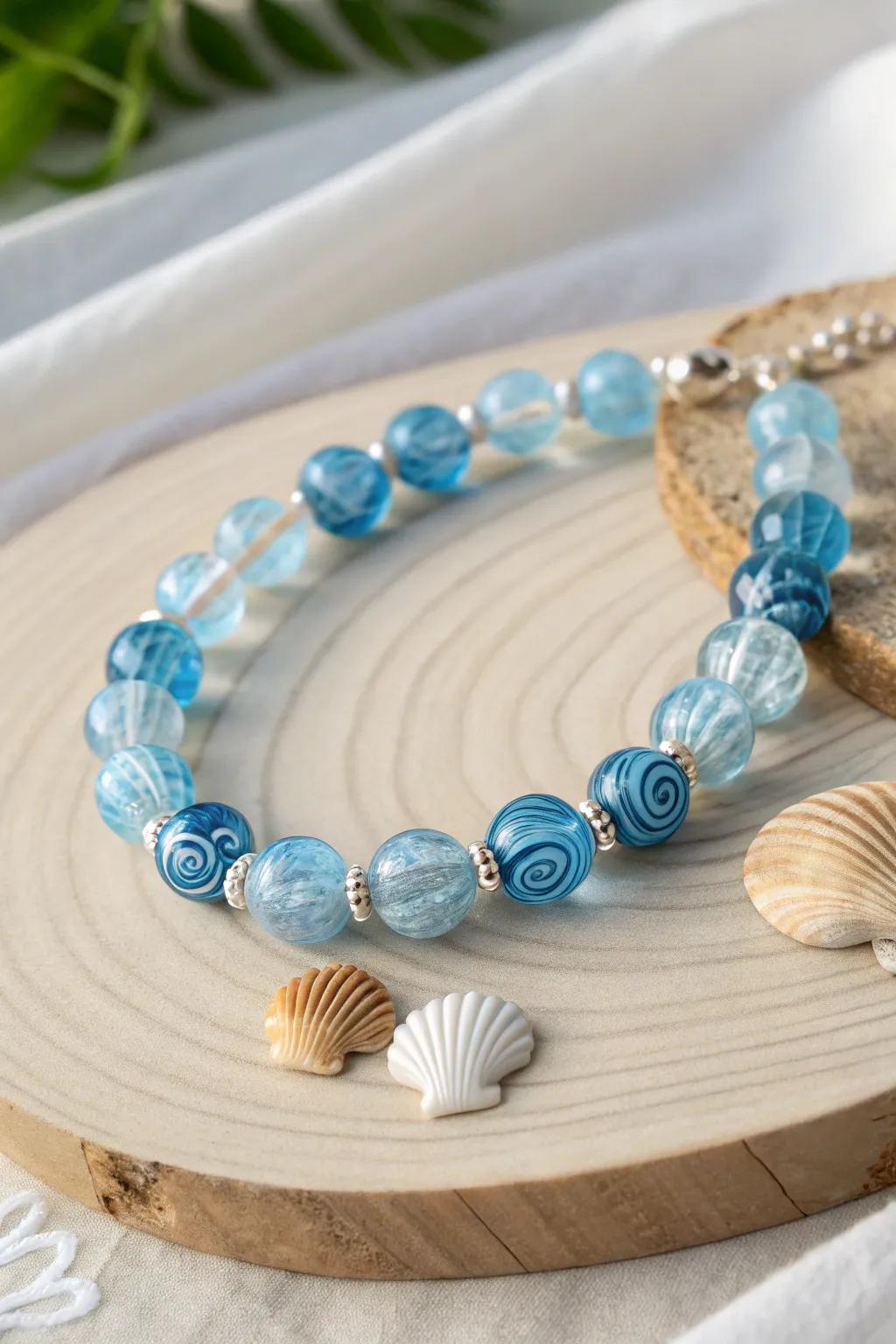 Embrace the ocean's embrace with the Ocean Swirl Charm bracelet—where elegance meets coastal serenity.