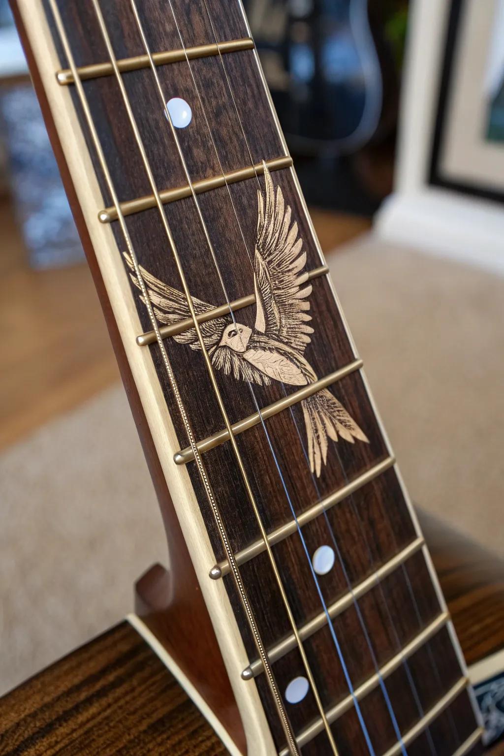Let your guitar sing with the whimsical charm of a handcrafted sparrow inlay.