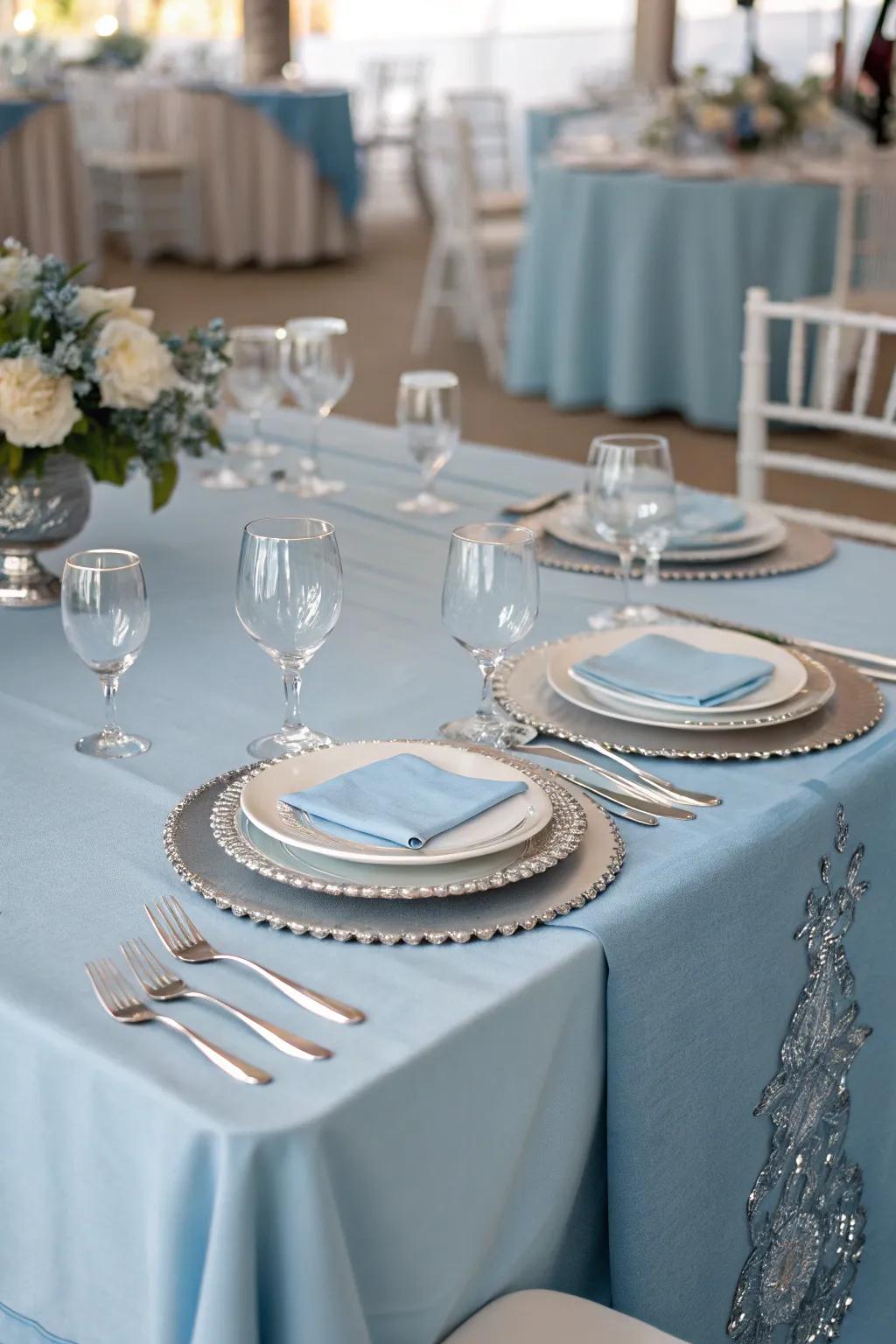 Dusty blue and silver create a serene and elegant wedding atmosphere.