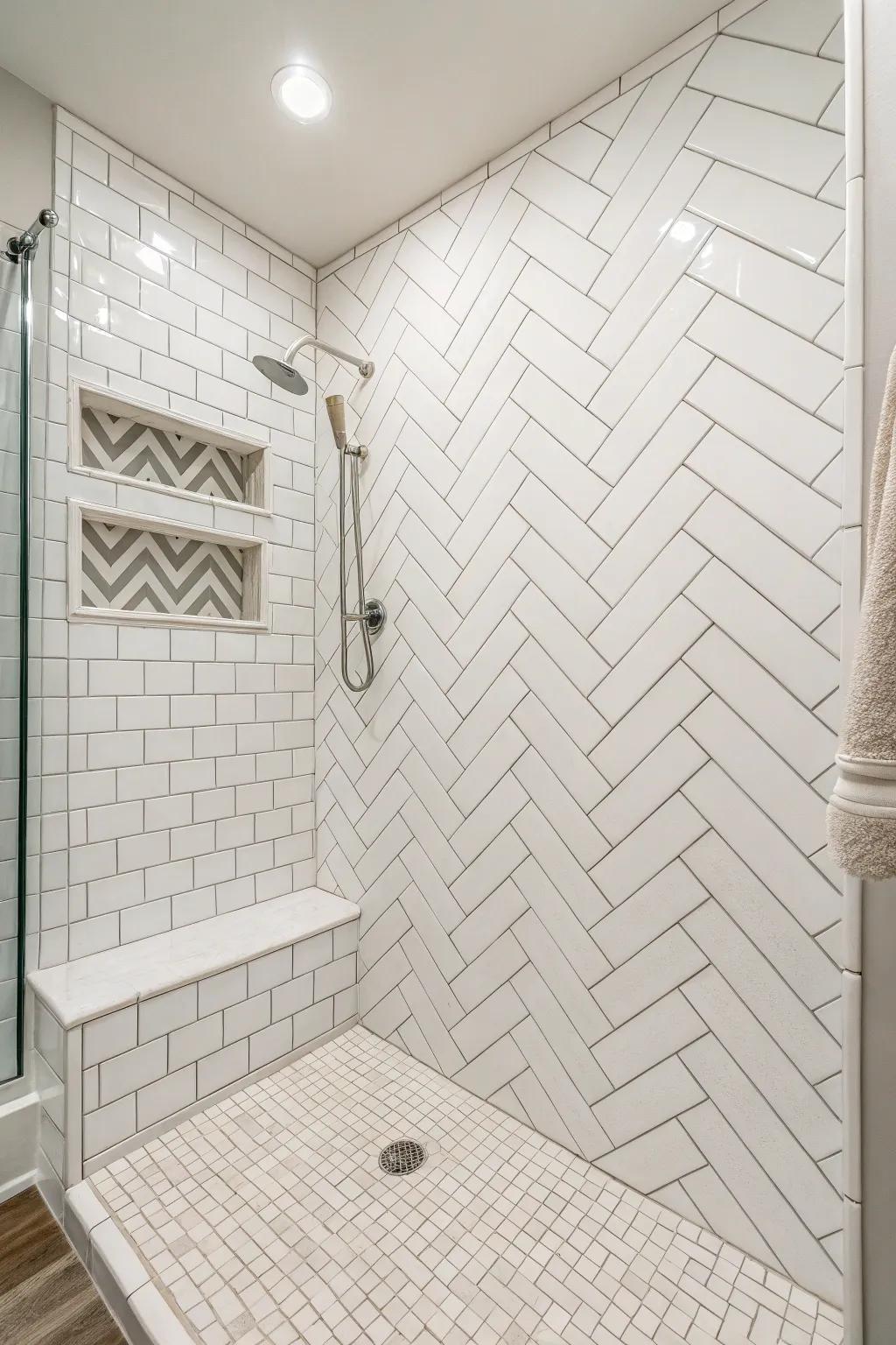Herringbone pattern adds sophistication to white shower tiles.