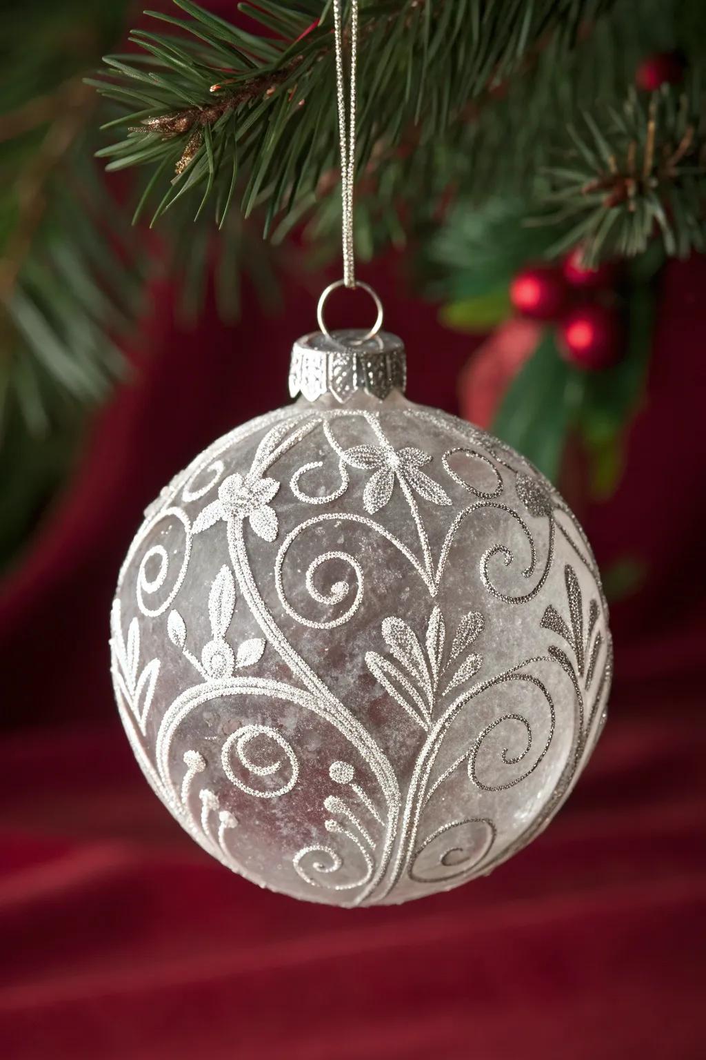 Elevate your holiday decor with the timeless elegance of etched glass ornaments.
