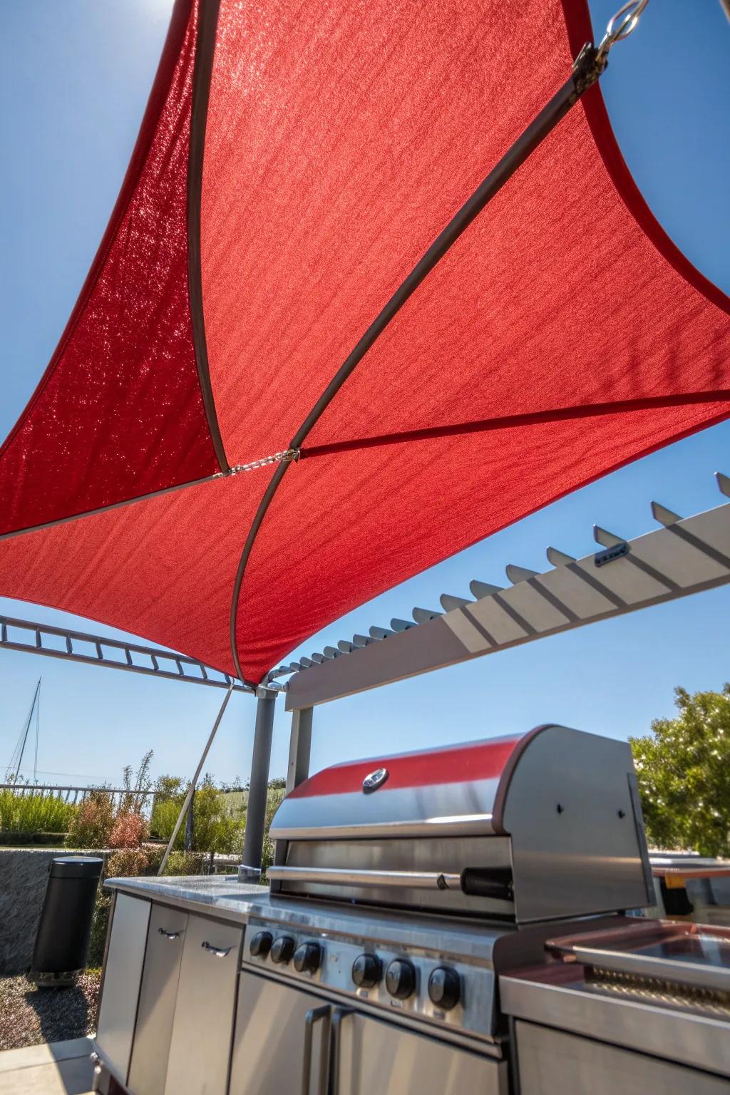 Elevate your grilling space with a touch of modern artistry—shade sails combine function with flair.