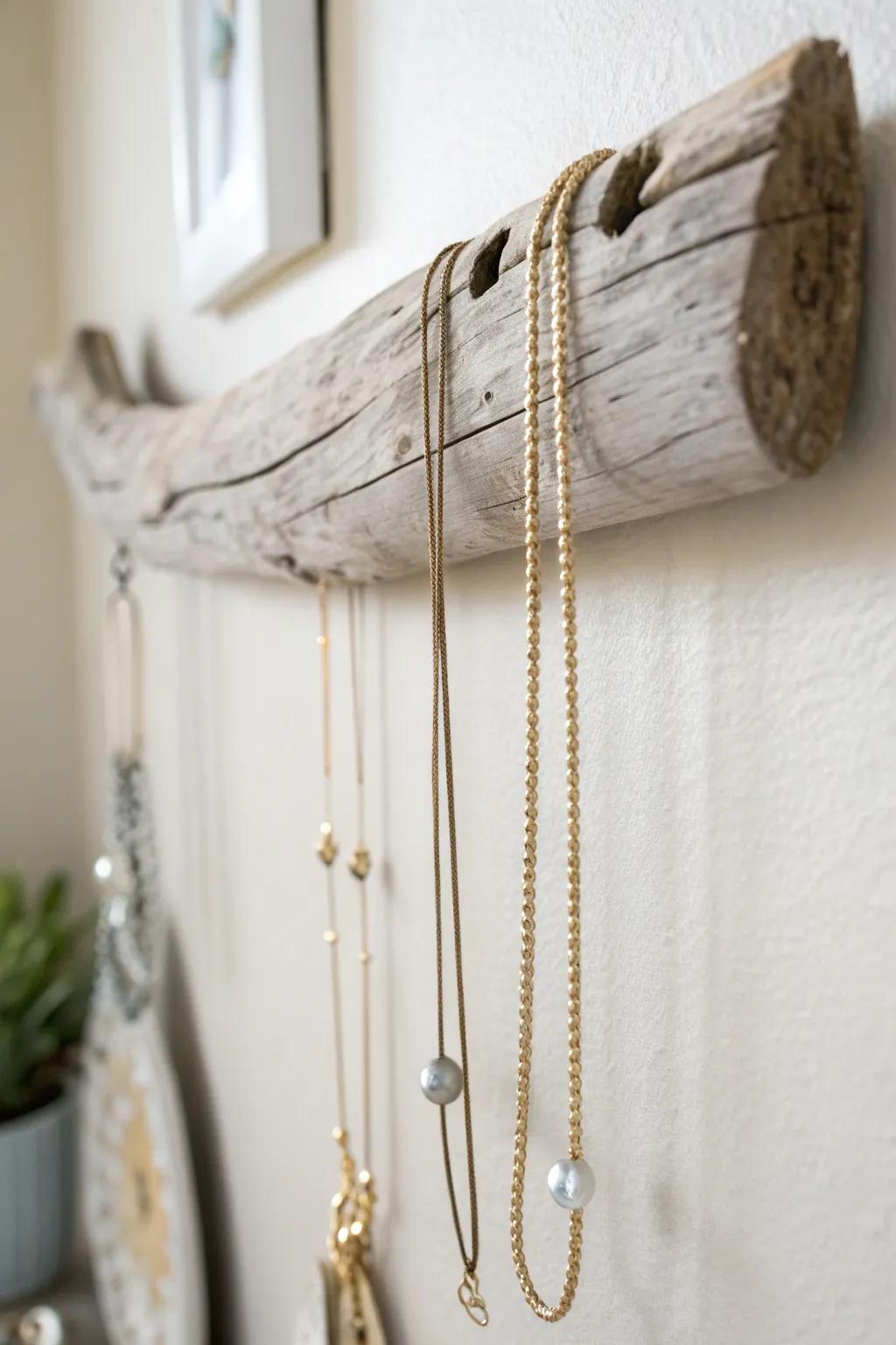 Embrace rustic elegance with this DIY driftwood necklace organizer, perfect for showcasing your jewelry with minimalist charm.
