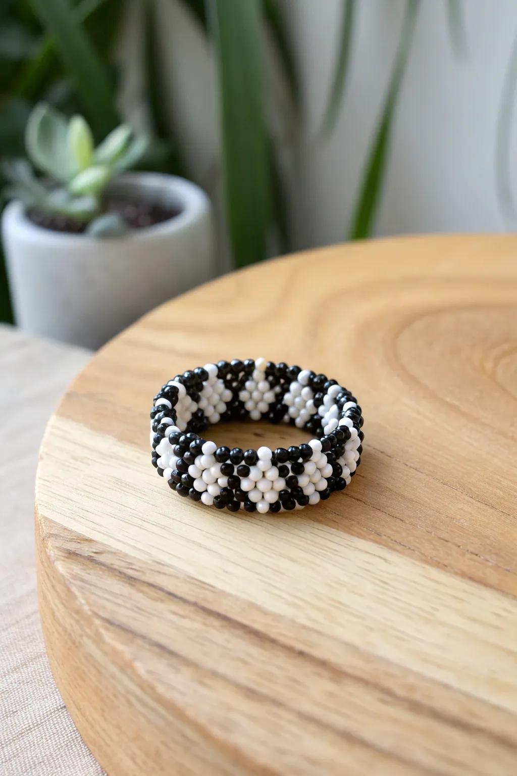 Embrace the elegance of simplicity with this monochrome seed bead ring.