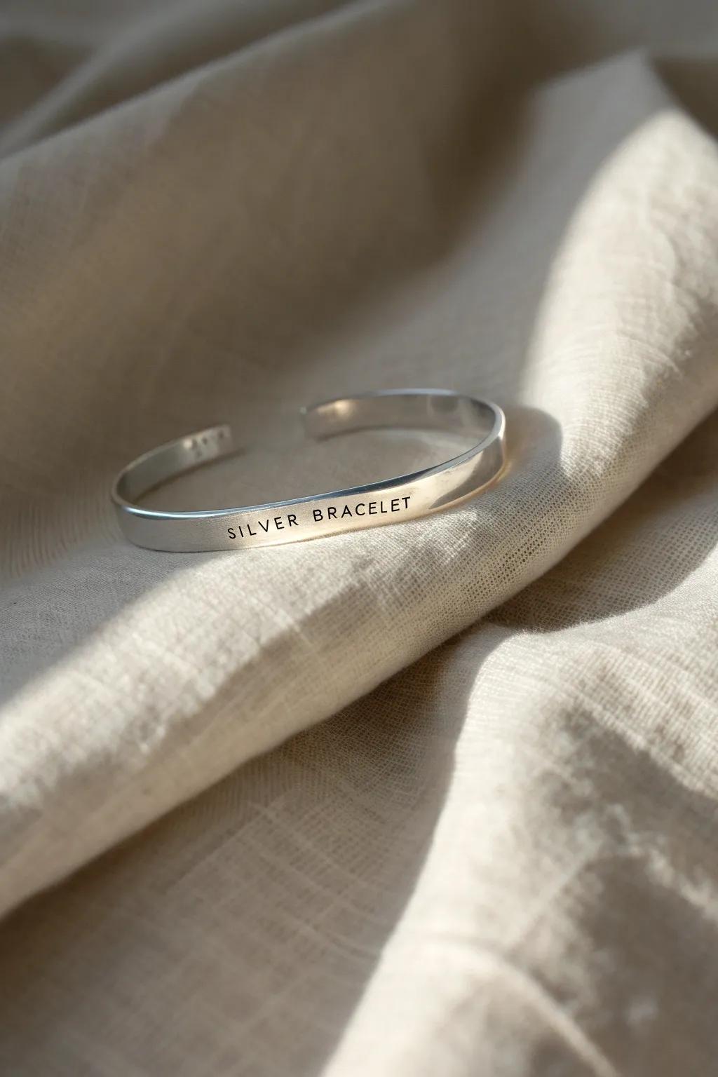 Discover the hidden charm: an engraved bracelet that whispers elegance.
