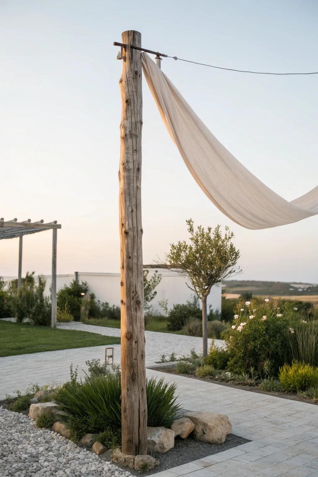 Transform your garden into a vintage postcard with the timeless beauty of reclaimed telephone poles.