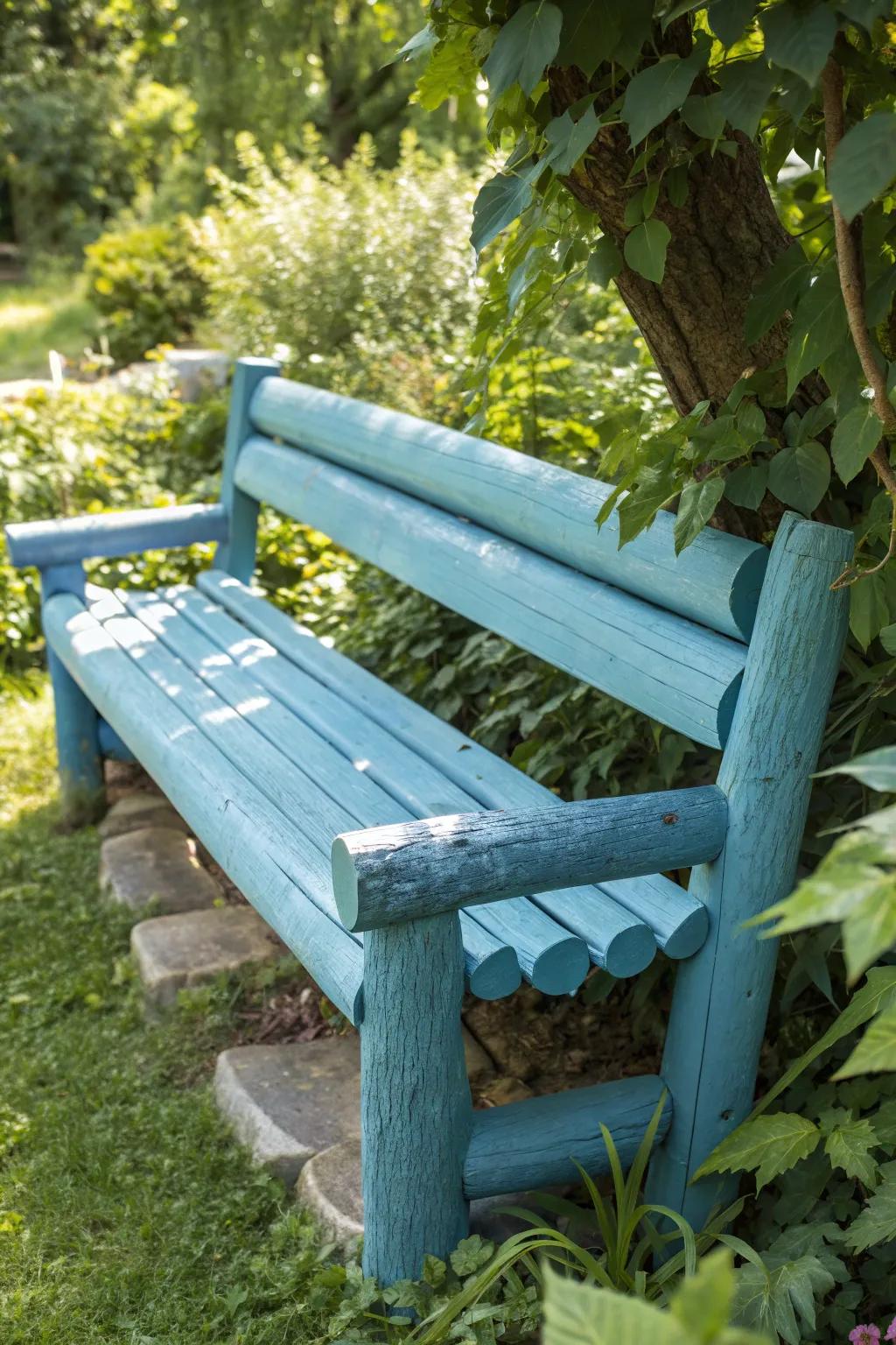 Transform your space with a pop of calming blue: the perfect handcrafted log bench for serene retreats.