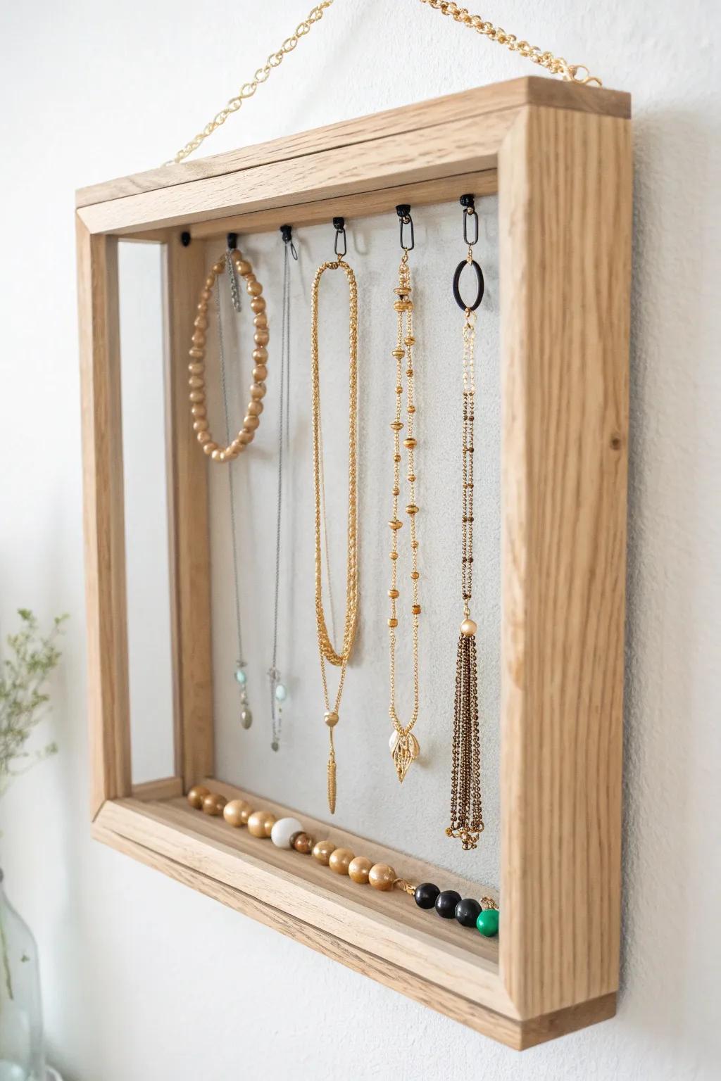 Showcase your necklaces in style with a chic shadow box display. Perfect for a minimalist touch with a Boho flair!
