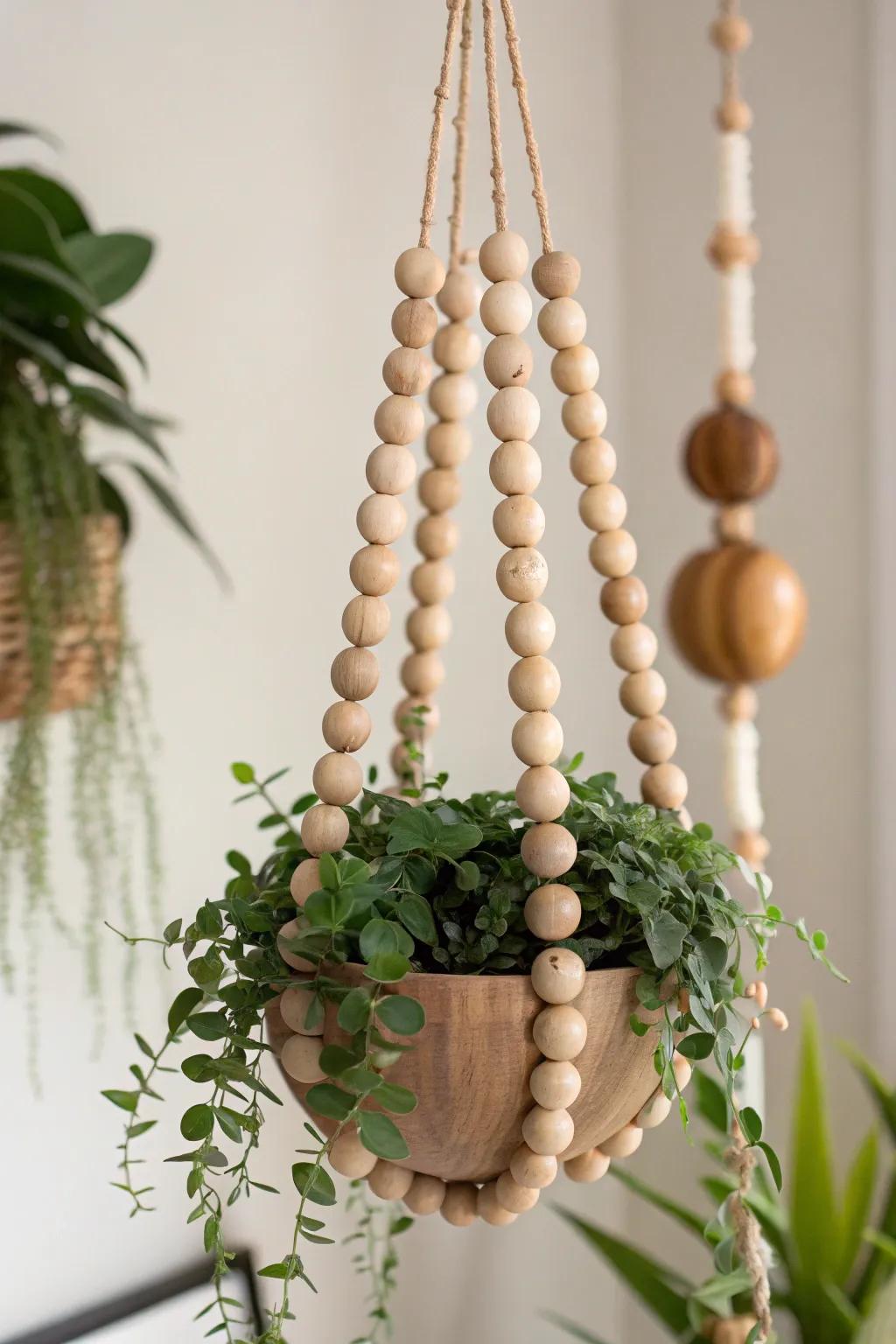 Elevate your greenery game with this stunning wooden bead hanging planter, where Scandinavian simplicity meets Boho charm.