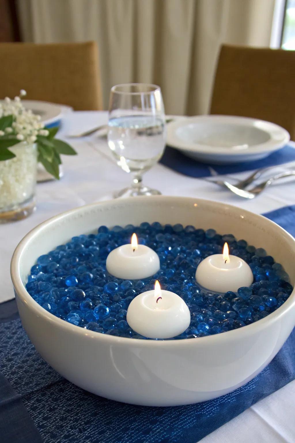 Floating candles on royal blue water beads create a magical and enchanting centerpiece.