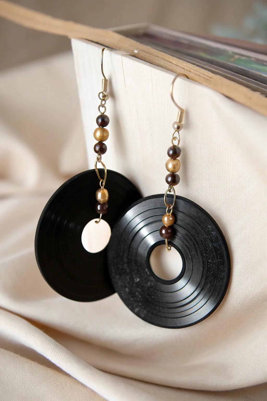 Elevate your style with these retro-chic vinyl record earrings, where vintage meets modern craftsmanship.
