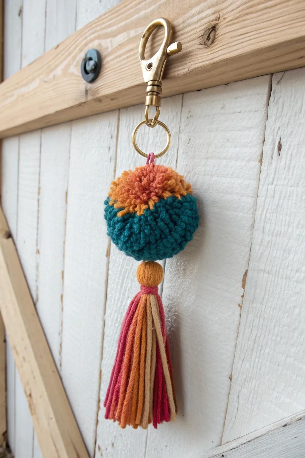 Add a pop of color and craftsmanship to your everyday essentials with a vibrant pom pom keychain. 🌈🔑 #ScandiBoho #PomPomLove