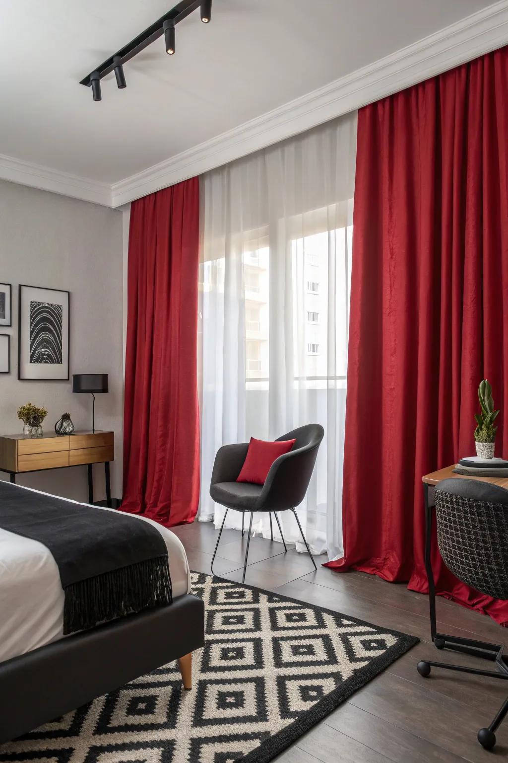 Red curtains add drama and warmth to this stylish bedroom.