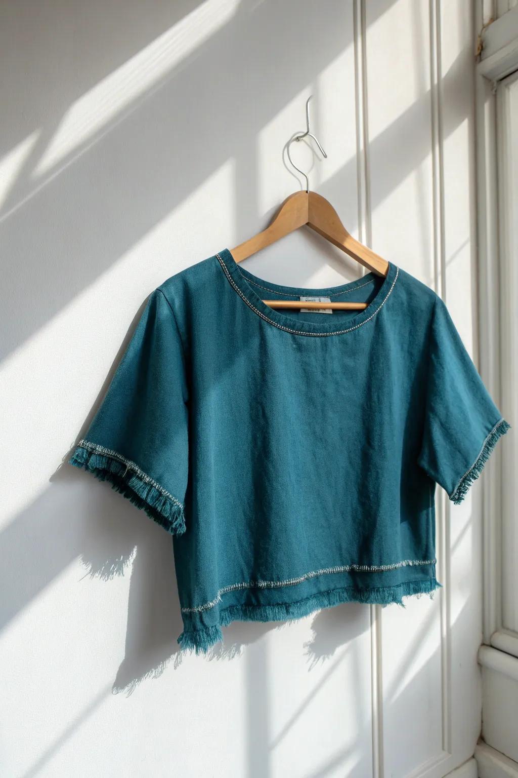 Transform your wardrobe with a chic upcycled crop top - where sustainability meets style.